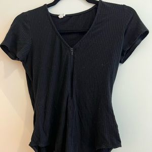 Black t-shirt bodysuit from Urban Outfitters. Ribbed. Size: US M. Gently worn.
